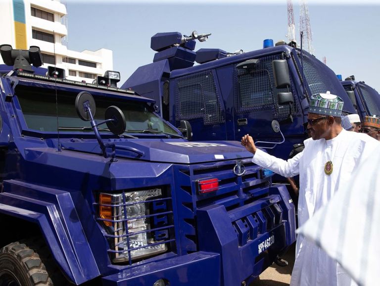 Pres Buhari With Police APC Vehicles 
