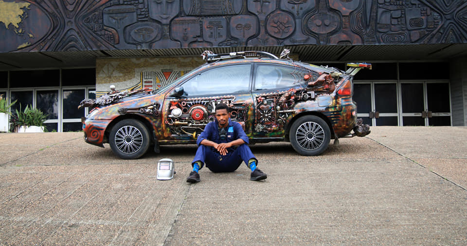 NYSC Corps Member Turn Mazda 323 Into An Art Piece Using Waste Materials