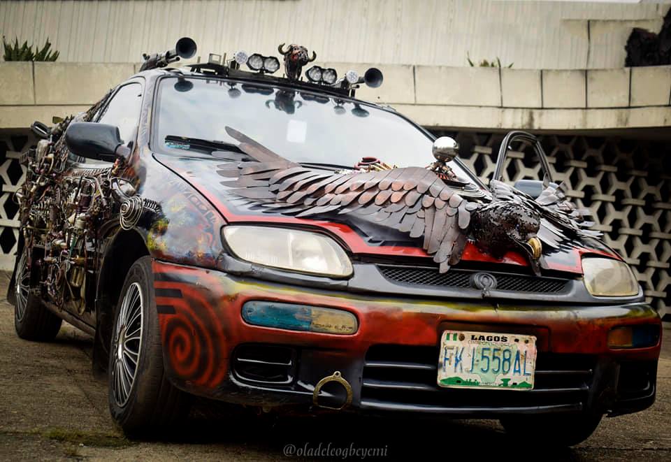 NYSC Corps Member Turn Mazda 323 Into An Art Piece Using Waste Materials