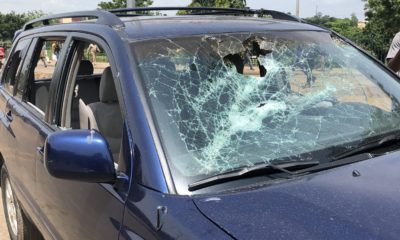 Cars Destroyed As Thugs Attack #EndSARS Protesters In Abuja