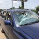 Cars Destroyed As Thugs Attack #EndSARS Protesters In Abuja