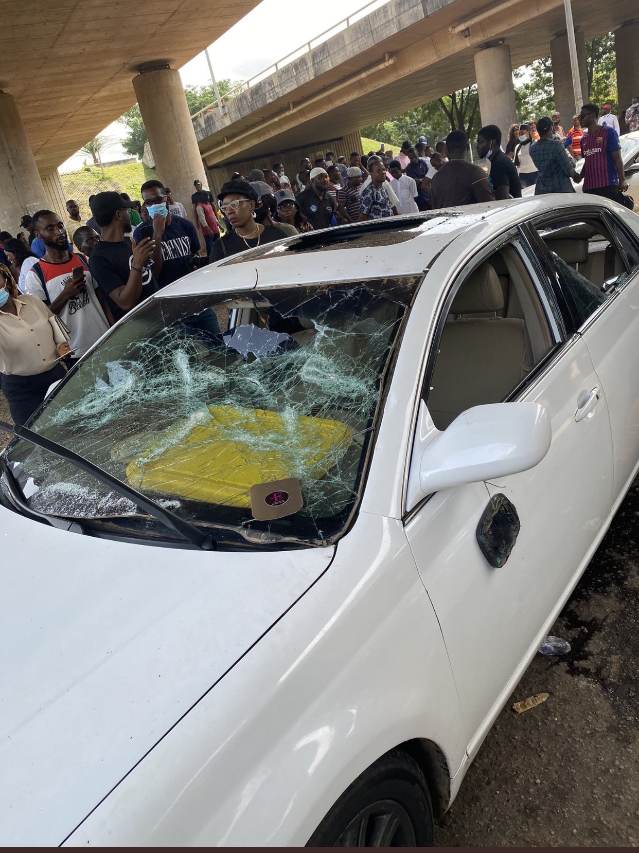 Cars Destroyed As Thugs Attack #EndSARS Protesters In Abuja