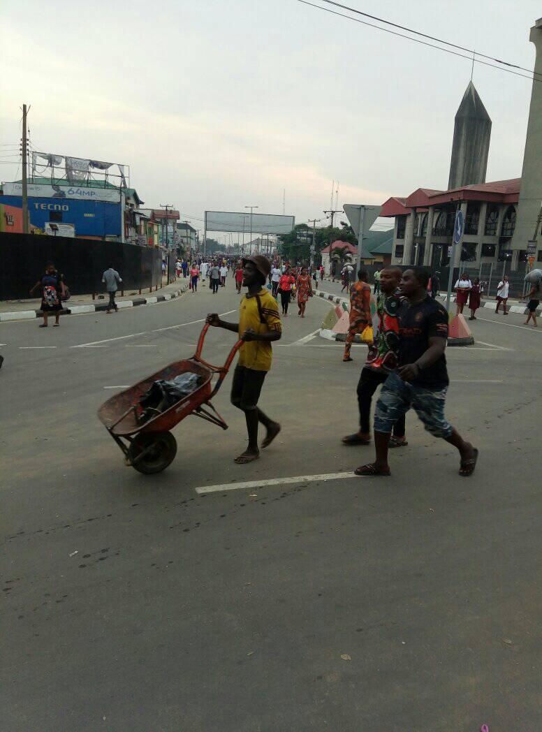 Passengers Crossing Rumuokoro Flyover In Port Harcourt