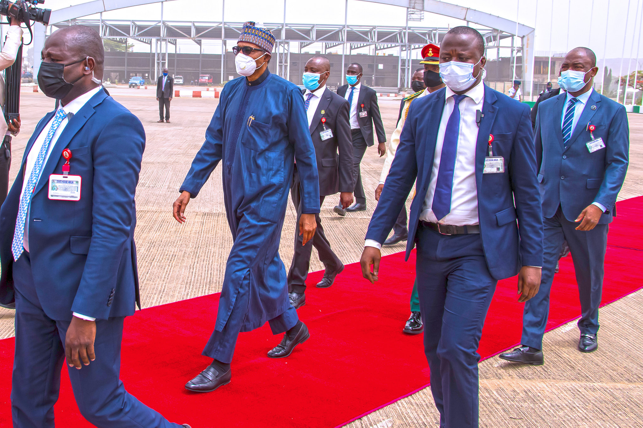 Pres Buhari At The Red Carpet departing for London